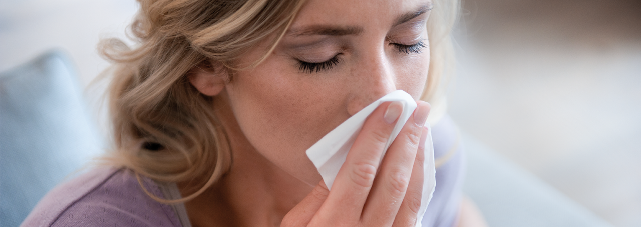 A woman holding a handkerchief.